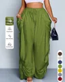 Dettaglio della coulisse e del tessuto traspirante dei pantaloni harem in lino verde oliva - Verde militare