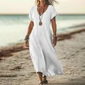Elegant white V-neck loose cotton linen maxi dress for women in a beach setting. - S / Top And Bottom / White