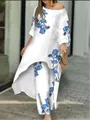 Full view of women's vintage floral print high-low top and wide-leg trousers set - S / Top And Bottom / Blue White Floral (3#)