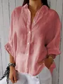 Detail of a pink breathable cotton linen shirt featuring button-down front and soft texture. - S / Tops / Pink