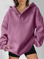 Detail view of women's mauve oversized hooded sweatshirt with a stylish V-neckline design - S / Tops / Purple