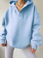Close-up detail of oversized light blue V-neck hoodie showing soft fabric texture - S / Tops / Light Blue