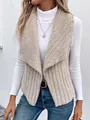 Close-up detail of a stylish beige faux shearling sleeveless vest for women in autumn - Khaki