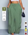 Pantaloni a lanterna a vita alta con coulisse da donna in tessuto di viscosa verde salvia - Verde brillante