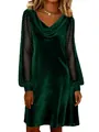 Detailed view of an elegant green velvet dress featuring sheer dotted mesh lantern sleeves - S / Top And Bottom / Dark Green