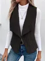 Dettaglio del gilet nero da donna senza maniche con collo in agnello e trama costine - Taglia S / Top / Nero