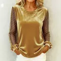 Elegant goudkleurig fluwelen topdetail met transparante mesh lange mouwen met stippen - Goud