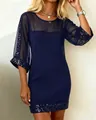 Detail of navy blue mesh dress with elegant sequin trim on cuffs and hemline - S / Navy Blue