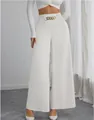 Elegant white high-waisted wide-leg pants with gold chain detail and elastic waist - S / Bottoms / White
