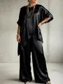 Detail view of stylish black satin two-piece set featuring loose top and wide-leg pants - S / Top And Bottom / Black