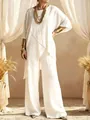 Detailed view of white linen two-piece set with irregular hem and wide-leg trousers - 3XL / Top And Bottom / White