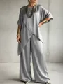 Detailed view of women's grey satin two-piece set with asymmetrical hem and wide-leg pants - S / Top And Bottom / Gray