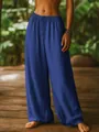 Close-up of blue cotton linen loose pants showing drawstring waist and texture - S / Bottoms / Blue