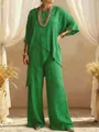 Full view of green linen two-piece set with asymmetrical top and wide-leg trousers - Green