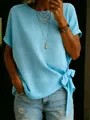 Close-up detail of a sky blue loose fit T-shirt featuring a stylish side-knot hem design - Sky Blue