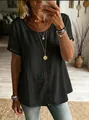 Detailed view of the intricate hollow-out lace trim on a black casual women's top. - Black