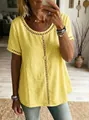 Casual women's yellow T-shirt with intricate hollow-out lace and textured fabric. - S / Tops / Yellow