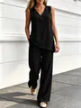 Detailed view of women's black V-neck sleeveless linen top and wide-leg pants set. - S / Top And Bottom / Black