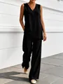 Detailed view of women's black V-neck sleeveless linen top and wide-leg pants set. - S / Top And Bottom / Black