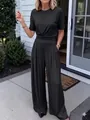 Full-body shot of women's dark olive two-piece set with short sleeve top and wide leg pants - S / Top And Bottom / Black