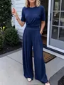 Detail view of navy blue two-piece set featuring short sleeve t-shirt and wide leg pants - S / Top And Bottom / Navy Blue