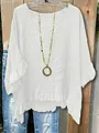Detalle de blusa blanca holgada con cuello en V y volantes en el dobladillo - S / Tops / Blanco