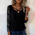Elegant black V-neck long sleeve top with shimmering sequin patchwork sleeves - S / Tops / Black