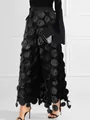 Close-up detail of black wide-leg trousers with unique 3D polka dot mesh fabric - S / Bottom (24261) / Black