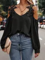 Close-up of elegant black cold-shoulder blouse featuring intricate floral lace applique - S / Tops / Black