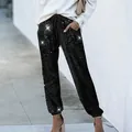 Women's black sequin drawstring joggers with sparkling finish for party or casual wear - S / Bottoms / Black