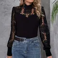 Elegant black long-sleeved top with floral lace cutout neckline and sleeves for women. - S / Tops / Black