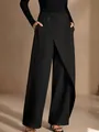 Close-up view of black asymmetric high-waisted wide-leg trousers with an elegant drape - S / Bottoms / Black