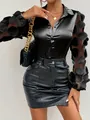 Close-up detail of black blouse with sheer floral applique sleeves and leather skirt - S / Tops / Black