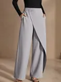 Detail view of high-waisted asymmetrical wide-leg trousers with elegant gray drape - S / Bottoms / Gray