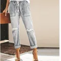 Stylish light blue distressed denim pants with elastic drawstring waist and cuffed hem. - S / Bottoms / Gray