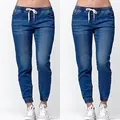 Blue denim joggers with elastic drawstring waist and tapered cuffed ankles for women - S / Bottoms / Dark Blue