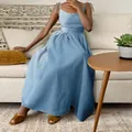 Detail of a light blue elegant maxi dress with spaghetti straps in a lifestyle setting. - S / Top And Bottom / Blue