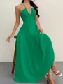 Detailed view of a vibrant green halter neck tiered maxi dress for summer beach vacations - S / Tops / Green