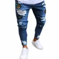 Men's slim-fit ripped jeans in light blue denim featuring decorative military badge patches - S / Bottom (805) / Blue