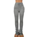 Detailed view of grey stacked joggers featuring adjustable high waist drawstring design - S / Gray