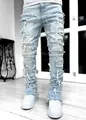 Jeans skinny uomo azzurro con vistose toppe sfrangiate e orlo a colonna impilato - Taglia S / Pantaloni e gonne / Azzurro
