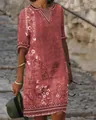 Detail view of terracotta ethnic print V-neck casual dress for summer - S / Red