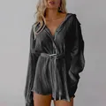 Detail of black pleated long-sleeve shirt dress with a waist belt - S / Tops / Black