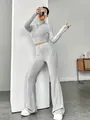 Grey ribbed knit two-piece set featuring slim crop top and high-waisted flared pants - S / Top And Bottom / Light Gray