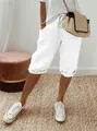 Detailansicht der weißen Baumwoll-Leinen-Freizeithose mit Kordelzug und Taschen. - S / Unterteile / Weiß