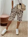 Detailansicht der Herren Sommer-Leinen-Shorts mit künstlerischem Kreismuster - S / Unterteile / Khaki Floral