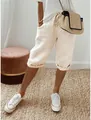 Stylische beige Caprihose aus Baumwollleinen mit elastischem Bund und Kordelzug - S / Unterteile / Aprikose