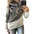 Detailed view of women's leopard print patchwork hoodie with a stylish cowl neck design - S / Tops / Leopard Print + Grey