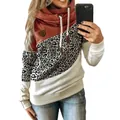 Detail showing women's color-block hoodie with leopard print and a stylish cowl neck. - S / Tops / Leopard + Orange