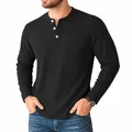 Close-up of black waffle knit Henley shirt with three buttons and pocket - S / Tops / Black